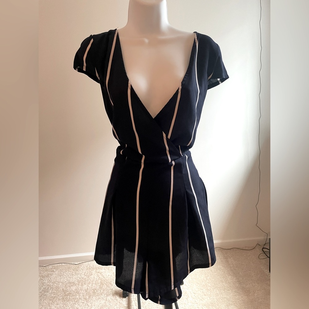 Very cute navy blue with white stripes romper.